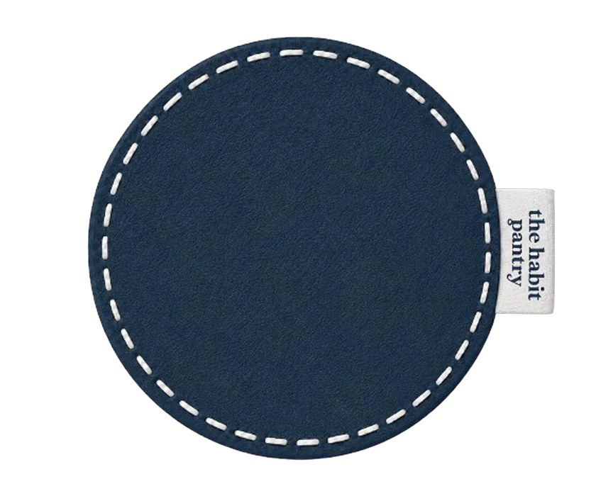 CUE-01 Midnight — navy leather sticker with white running stitch.